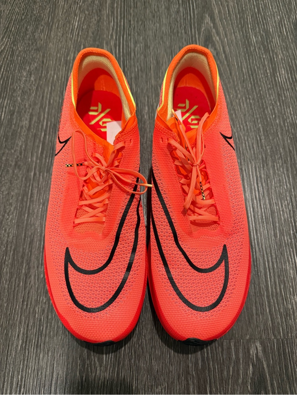 Nike Men’s Bright Orange Lightweight Running Shoes with Black Swoosh